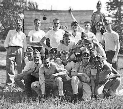 A bunch of the guys in Opti-Corps. Bud Parker is the adult in the photo with Phil Hennings to his left (1955)
Submitted by Phil Hennings
Keywords: 1955