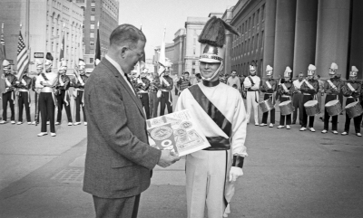 Barry Bell with a presentation for someone from the Optimists Club  (Optimist Club Convention, 1960) 
Photo by Don Daber
Keywords: 1960