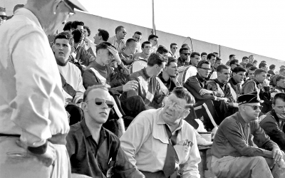 Members of the Optimists in the stands (Rochester, 1960)
Photo by Don Daber

L-R: Row 1: Clare Reid, bus driver, Glenn Copp's father

Row 2: Mike Layton, (? Guard member), Len Perrin, Ivor Bramley,
Mel Dey, Al Punkari, Bob Owen, Bill Thorne, Bob Brown,(?), Al Miller

Row 3: Al Morrison & Joe Gianna (talking to spectator behind),
Glenn Copp, Glen Durish, Doug McPhail, Hector Roberts, Gord O'Halloran,
Bill Ukas?, (?), (?), (?), Dennis DiCarli, Henry Beben
Keywords: 1960