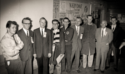 Optimists staff (First Rally Night, 1960)
L-R: Doug McPhail, Jim Patten, Barry Bell, Ed Nanni, Al Morrison, Mr Baggs, Phil Hennings, Bernie Beer and Ivor Bramley
Photo by Don Daber
Keywords: 1960
