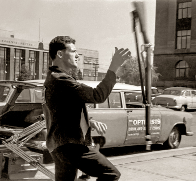 Ivor Bramley tossing his rifle (waiting to leave at waterfront, 1960)
Photo by Don Daber
Keywords: 1960