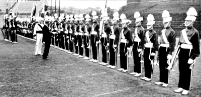 Toronto Optimists, Phil Hennings is Drum Major (1960)
(Bill Thorne on the end, Al Morrison is 4 guys in and Doug McPhail 5 guys in)

From 1967 members manual
Keywords: 1960