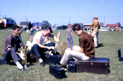 Toronto Optimists members polishing their horns before a show in Kitchener (1960)
L-R: Jim Stewart, Bill Thorne, Ron Cottrell
Photo Submitted by Terry Sweeney
Keywords: 1960