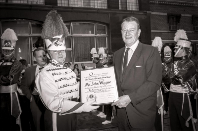 Jim McConkey presents John Wayne with honourary membership in the Optimists (June, 1962)
Photo by Don Daber
Keywords: 1962