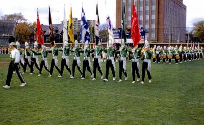 Toronto Optimists (Metro Championships, Varsity Stadium, 1962)
Looks like Midtowners beside Optimists with Conqueror coming on.

Photo by Don Daber
Keywords: 1962