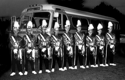 First show with the new uniforms plus the new baritone horns (Rome, NY 1962)
Left to Right: 
Dave Watt, Ron Cottrell, Mel Dey, Glen Durish, Rick Boehnke, Robin Weatherstone, Dick Ward, Al Lavigne, Bill Thorne

Photo by Don Daber, submitted by Mel Dey
Keywords: 1962