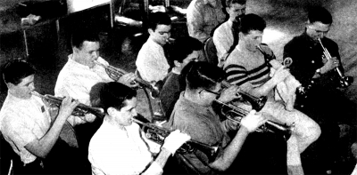 Rehearsing, winter 1964
L- R
Rear: Doug Mackenzie, John Shearer, ?, Ed Collins
Front: Bill Holloway, Gary Corbett (?), Barry Radford, Barry Stinson (?)

From Green Capsule Comments
Photo probably by Don Daber
Keywords: 1964