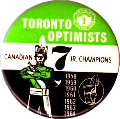 Toronto Optimists 1964 Corps button (7 years)
Submitted by Randy Cochrane
Keywords: button 1964