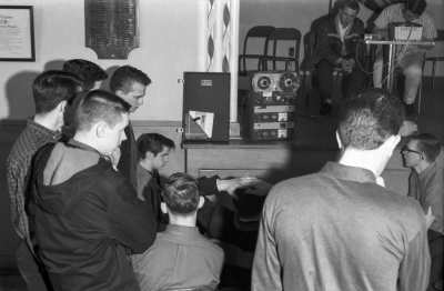 Corps members listening to a new song (Indoor, 1964)
Photo by Don Daber
Keywords: 1964