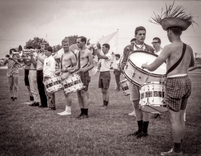 Larry Greenwood is playing Toronto Optimists first mellophone (Racine, WI, 1964)
Photo by Don Daber

L-R: Larry Greenwood, Vern Johansson, Mark Wicken, Orest Burak, Bill Grigg, Emilio Russo, John Whiting (glasses), Ron Kaiser (playing on bass)
Keywords: 1964