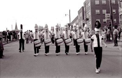A young Vern Johannson leads the Toronto Optimists who are wearing their summer parade uniforms (Shawinigan, 1964)
Photo by Don Daber
Keywords: 1964