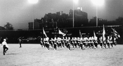 Toronto Optimists at Varsity Stadium, in Toronto (Junior International, June 2, 1962)
Jim McConkey DM and corps in "old" uniforms

Photo Submitted by Phil Hennings
Keywords: 1962