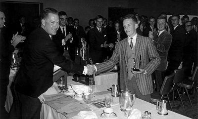 Don Daber making presentation to Dave Simms (probably 1965 banquet)
Keywords: 1965