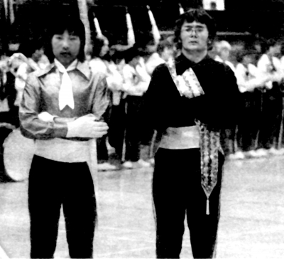 Lancers: Marty King (deceased) & Dave Burgess (in black) 1972
Dave is one of the drum majors in our Alumni Corps 
From Green Capsule Comments
Keywords: 1972