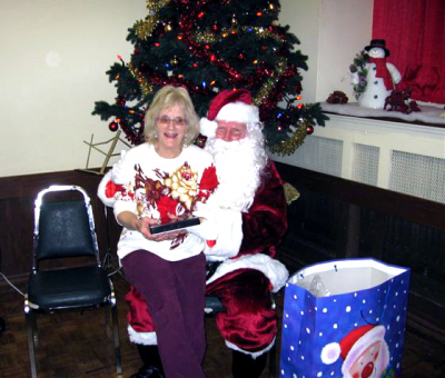Santa with Mary from the Legion (Christmas, 2006)
Photo submitted by Phil Hennings
Keywords: 2006