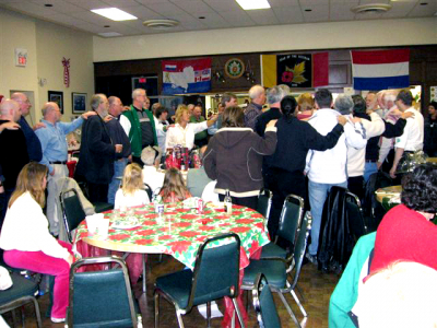 Singing the Corps Song, Christmas (2006)
Photo submitted by Phil Hennings
Keywords: 2006