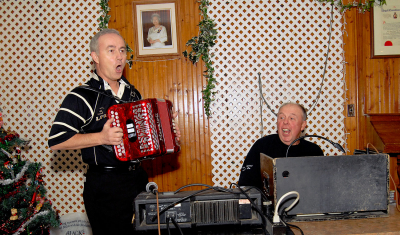 Doug Roblin and Rick Shearer (Christmas Social, 2009)
Photo by Eric McConachie
Keywords: 2009