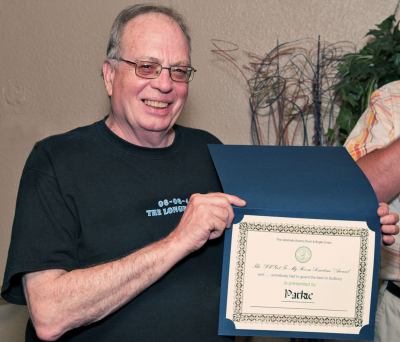 John Parkinson with his award (Rochester, 2011)
Photo by David Johns
Keywords: 2011