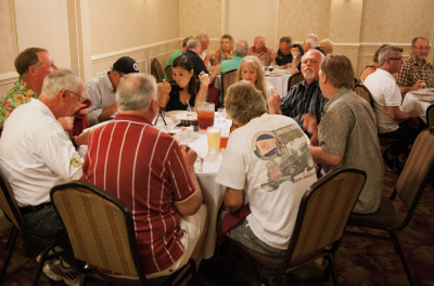 Relaxing over a meal at the corps dinner (Annapolis, 2012)
Photo by David Johns
Keywords: 2012