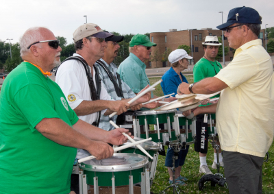 Optimists Alumni drumline rehearsing (July, 2012)
Photo by Eric McConachie
Keywords: 2012