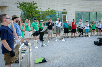 Optimists Allumni rehearsing (DCA, Annapolis, 2013)
Photo by Eric McConachie
Keywords: 2013