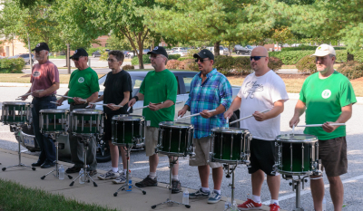 Optimists Allumni rehearsing (DCA, Annapolis, 2013)
Photo by Eric McConachie
Keywords: 2013
