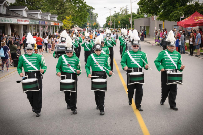 Optimists Alumni in parade (Highland Creek, 2014)
Photo by David Johns
Keywords: 2014