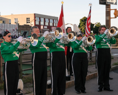 Some of Optimists Alumni horns warming up before parade (Rochester, 2014)
Photo by Eric McConachie
Keywords: 2014