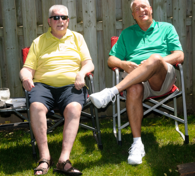 John and Mike (BBQ after Highland Creek Parade, 2015)
Photo by Eric McConachie
Keywords: 2015