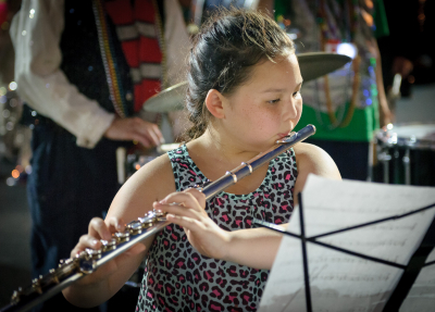 Lindsay Weiler, Soo's daughter, entertains the corps with a flute solo (Soundsport, Indianapolis, 2016)
Photo by David Johns
Keywords: 2016