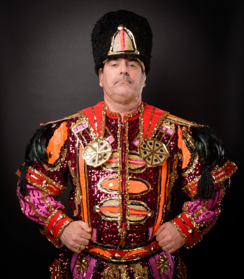 Peter Jones, Optimists Alumni Drum Major (Mardi Gras costume, 2016)
Photo by David Johns
Keywords: 2016