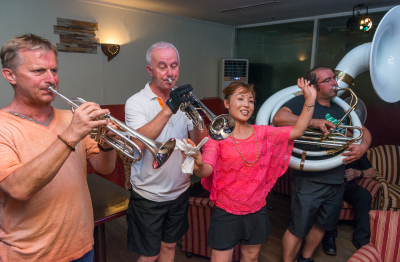 Member of the Bavarian band, Doug, Soo and another member of the Bavarian band (Jeju, 2017)
Photo by David Johns
Keywords: 2017