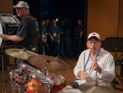 Ric Brown and Doug Darwin, Optimists Alumni rehearsing (with some volunteers in the wings) (Jeju, South Korea, 2017)
Photo by David Johns
Keywords: 2017