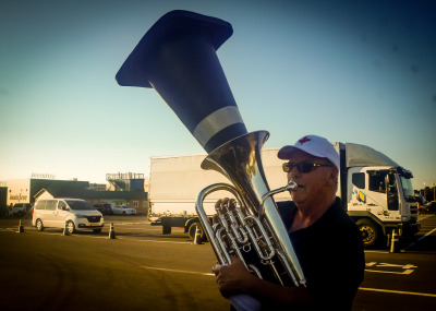 Dave Bruce tries out a new mute, Optimists Alumni (Jeju, South Korea, 2019)
Photo by Laura and Lindsay Weiler
Keywords: 2019