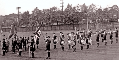 18th Troop Scout Band, pre-cursor to the Optimists, in a Scout Parade at Oakwood Collegiate (1952)
Photo submitted by Phil Hennings
Keywords: 1952