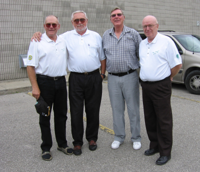 Warren Mills,  Henry Beben,  Phil Hennings, Jim Patten.  All were playing members from 1952 to 1960. Photo was from July 2005 in Waterloo.
Photo submitted by Phil Hennings
Keywords: 2005 1960