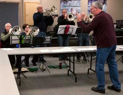 Dave Mackinnon and some of the horns (Kitchener Rehearsal, 2012)
Photo by Eric McConachie
Keywords: 2012