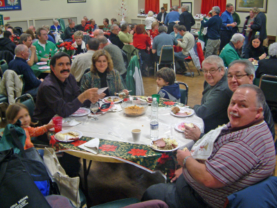 Bryan & Pat Buttigieg (bracketed by their children), Gary Corbett, Ron Chong, John Shearer (Christmas Party, 2005)
Photo by Frank Rood
Keywords: 2005
