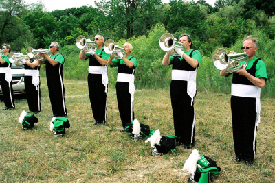 Optimists Alumni playing after the parade (Cambridge, 2007)
R-L: George Wright, Bill Kane, Paul Blanchard, Mike Lang, Ron Cottrell, John Petti (no head), Ed Wilson

Photo by Eric McConachie
Keywords: 2007