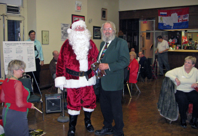 Santa with Paul Thompson, Belated Christmas party (Jan. 2008)
Photo submitted by Phil Hennings
Keywords: 2008