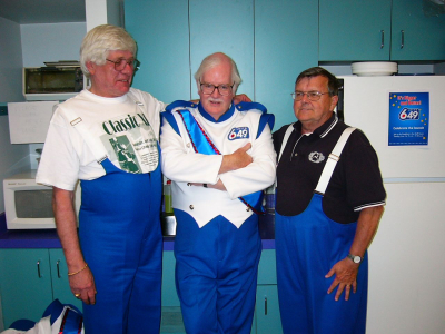 Frank Rivier, Bob Keenan and Tery Sweeney, Optimists Alumni dressed for Lotto 6/49 promo (2004)
Frank and Terry consoling Bob who wanted to wear his Optimists uniform
Keywords: 2004