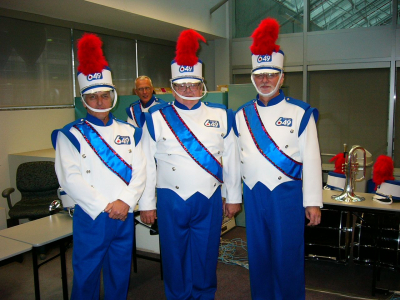 Warren Berger, Gary Corbett and Dave Kirton, Optimists Alumni dressed for Lotto 6/49 promo (2004)
Keywords: 2004