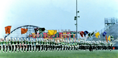 Toronto Optimists (CNE, 1969)
Randy Cochrane says: I think the drummers from left to right are Jim Taylor, Rick Roussell, Larry Blandford, Dana Burrage,
Dennis May, Dave Harris & ?. Boy I wish I could remember the last tenor drummers name. He was French Canadian from Les Mets.

Photo submitted by Ric Brown
Keywords: 1969