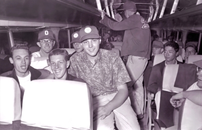 L-R: Harry Clark, Dennis DiCarli, Ronn Prokop, ?, Briam Williams, Jim Fletcher?, Barry Bell (standing), Kenny Nakagawa, and a piece of Warren Mills (on the bus, 1960)
Photo by Don Daber
Keywords: 1960