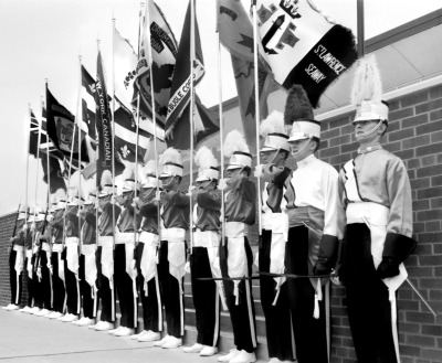 Toronto Optimists Colour Guard (WLU, Waterloo, after Nationals prelims, 1963)
Photo by Don Daber

L-R: Chuck Clutterbuck (Rifle), Ron Cooper, Tom Bedford, Jim Bedford (Rifle), Jim Nisbet, Bob Carell, John Diamond, Bob Keenan, Fred Lombard, Mike Powers, Al Peczeniuk, Ron Lombard, Emilio Russo, Jack Young, Andy Henderson (Guard Captain), Gene Chepswick (Guard Sergeant)
Keywords: 1963