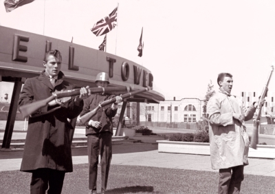 L-R: Bill McNabb teaching Nelson Duffy and John Diamond how to toss a rifle (Shell Tower, CNE, 1964)
Photo by Don Daber
Keywords: 1964