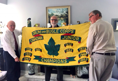 Jim Patten, Bob Carell and Phil Hennings with Optimists' old Canadian Championship flag (1958 - 1966)
Photo by Vern Reid
Keywords: 1966