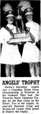 Maureen Craig and Lynne Date of Marching Angels with trophy
An old clipping submitted by Maureen Bell
