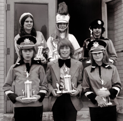 Recipients of the Optimists Cadets Awards (1975)
Lynn Oram, Guard-of-the-Year; Lynda Baillie, Cadet-of-the-Year; Bob Moore, Section-of-the-Year; George Price, Drummer-of-the-Year; Victor Decloux, Bugler-of-the-Year and Pat Tunney, Rookie-of-the-Year

Photo by Don Daber
Keywords: 1975